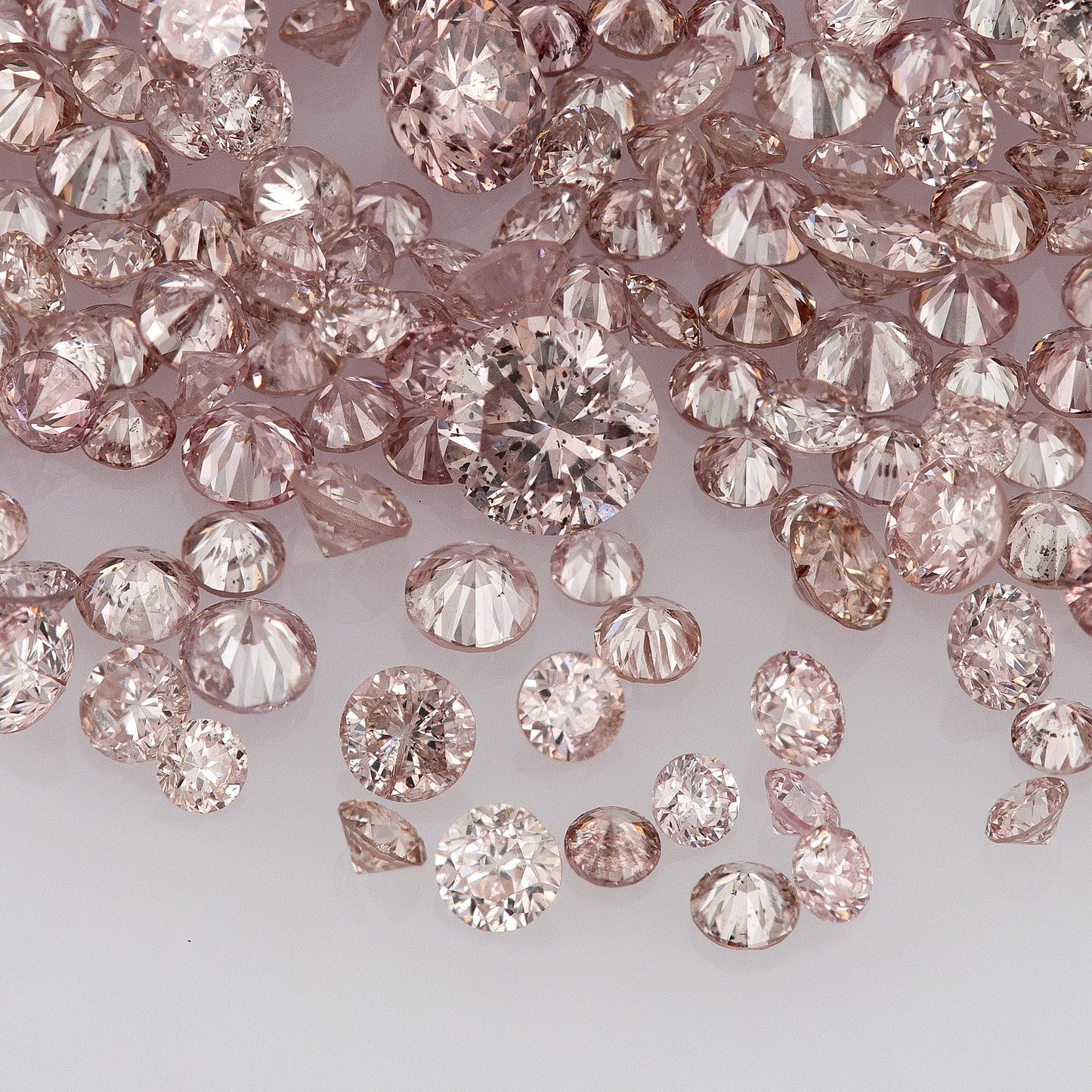 Fancy Intense Pink Rose 7PR | Argyle Pink Diamonds | Select | Untreated Natural | Round Melee Accents | Argyle