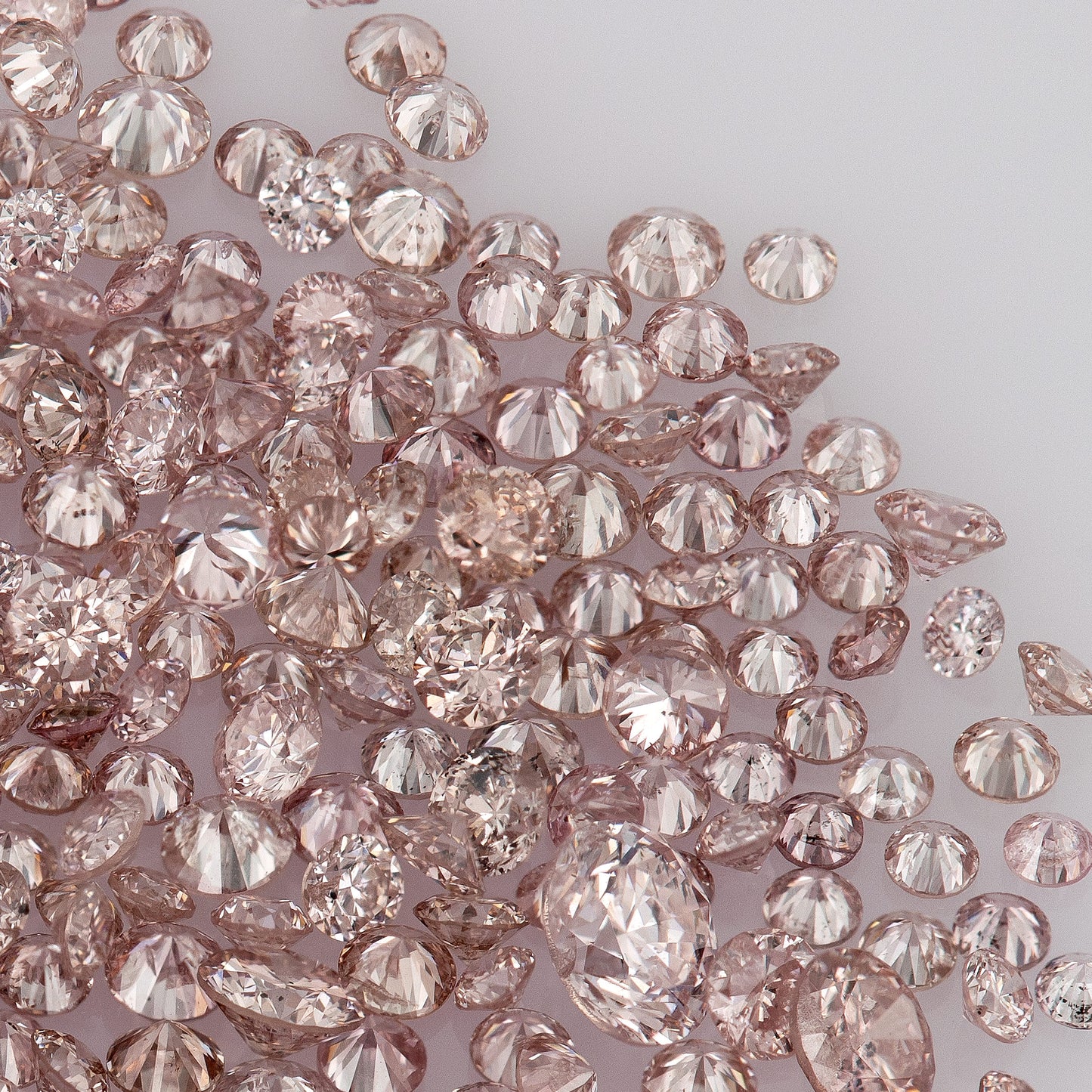 Fancy Intense Pink Rose 7PR | Argyle Pink Diamonds | Select | Untreated Natural | Round Melee Accents | Argyle