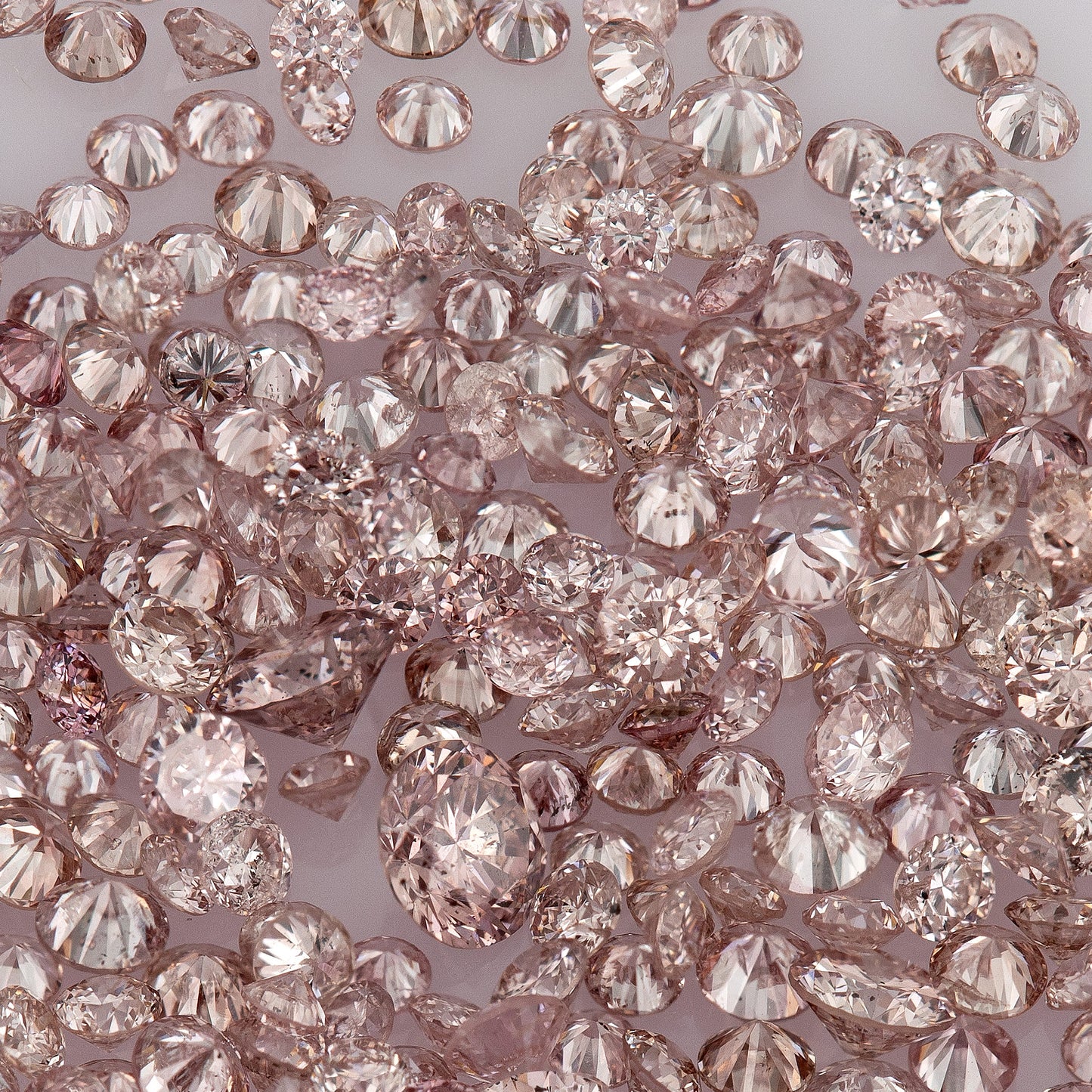 Fancy Intense Pink Rose 7PR | Argyle Pink Diamonds | Select | Untreated Natural | Round Melee Accents | Argyle
