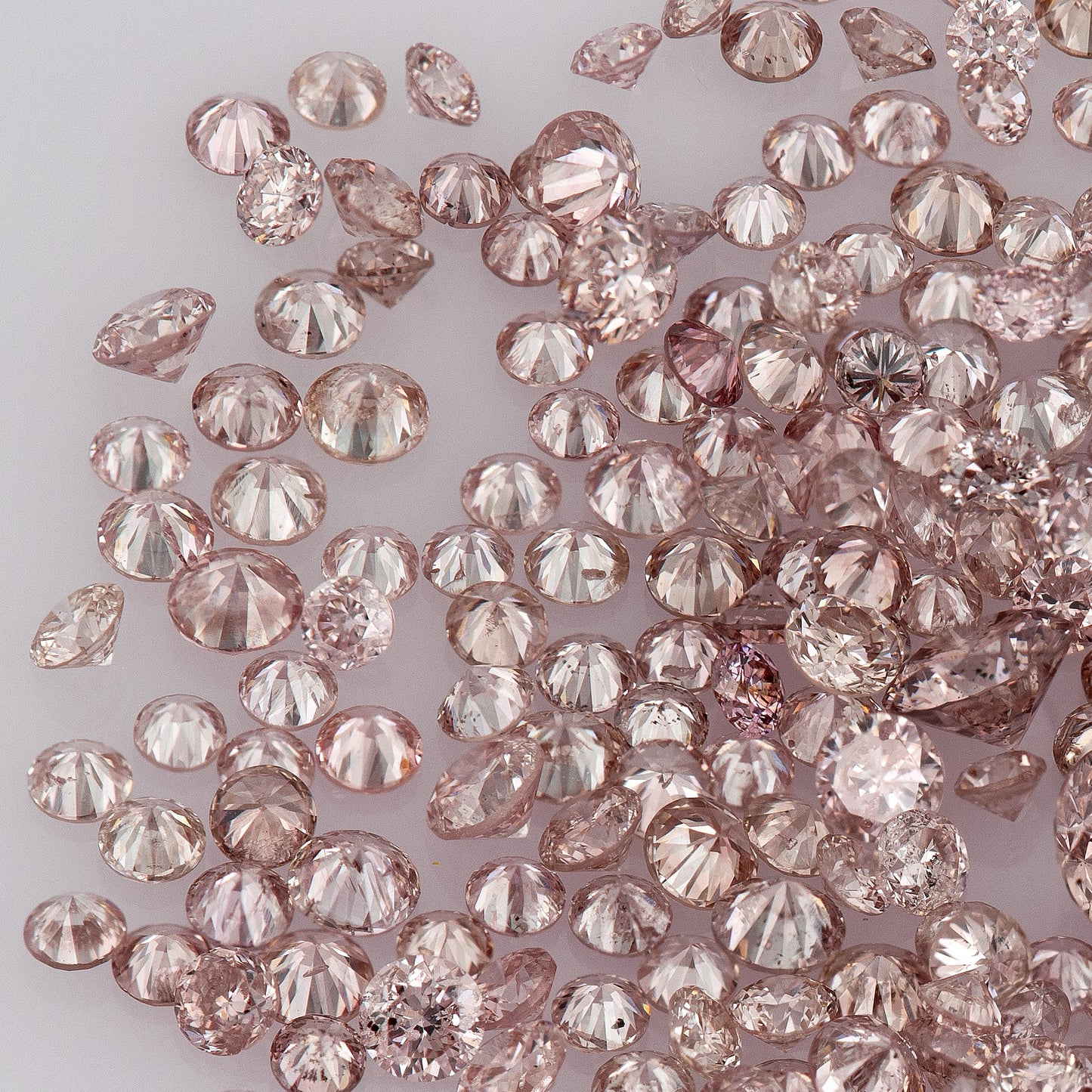 Fancy Intense Pink Rose 7PR | Argyle Pink Diamonds | Select | Untreated Natural | Round Melee Accents | Argyle