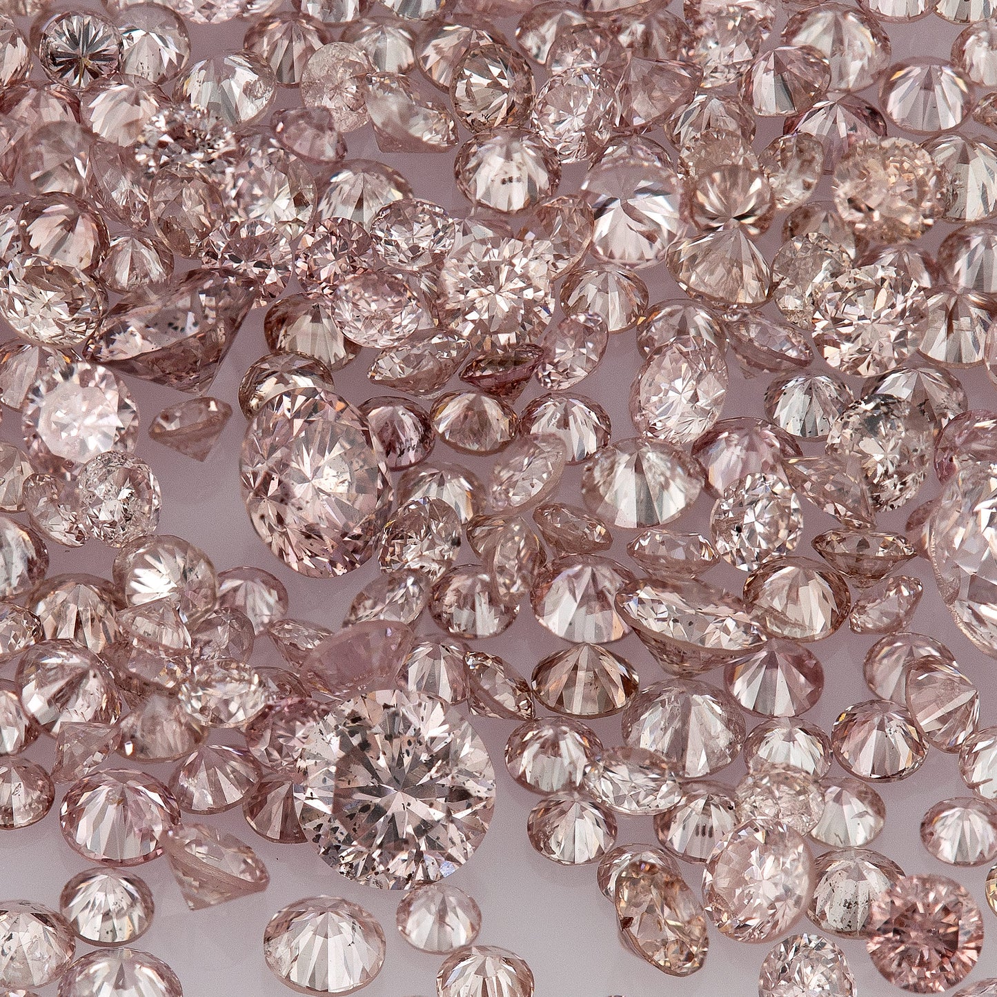 Fancy Intense Pink Rose 7PR | Argyle Pink Diamonds | Select | Untreated Natural | Round Melee Accents | Argyle