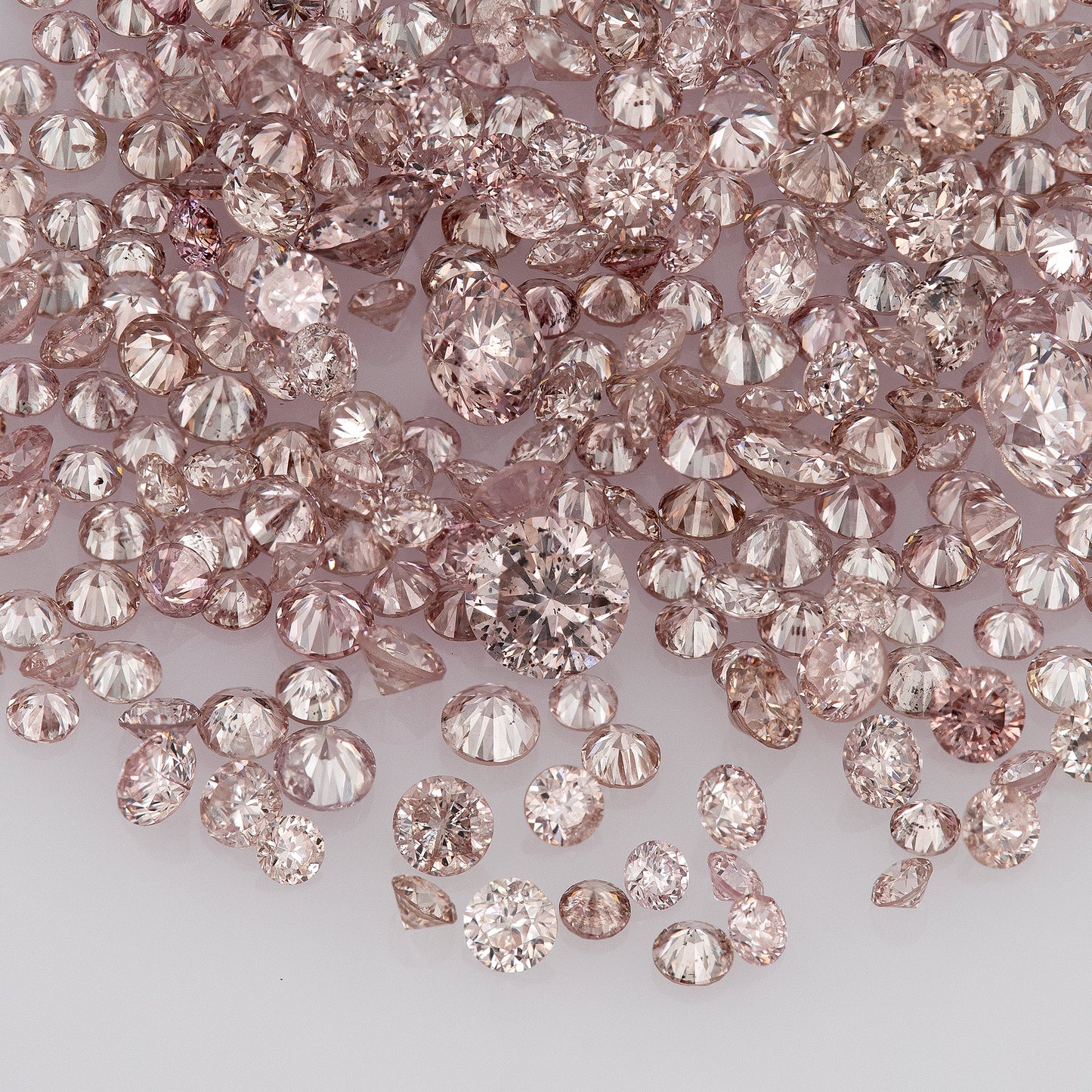 Fancy Intense Pink Rose 7PR | Argyle Pink Diamonds | Select | Untreated Natural | Round Melee Accents | Argyle