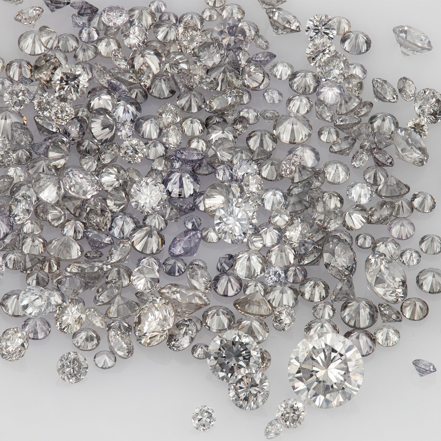 Fancy Grey / Violet | Argyle Grey Diamonds | Select | Australian | Untreated Natural | Round Melee Accents | Argyle