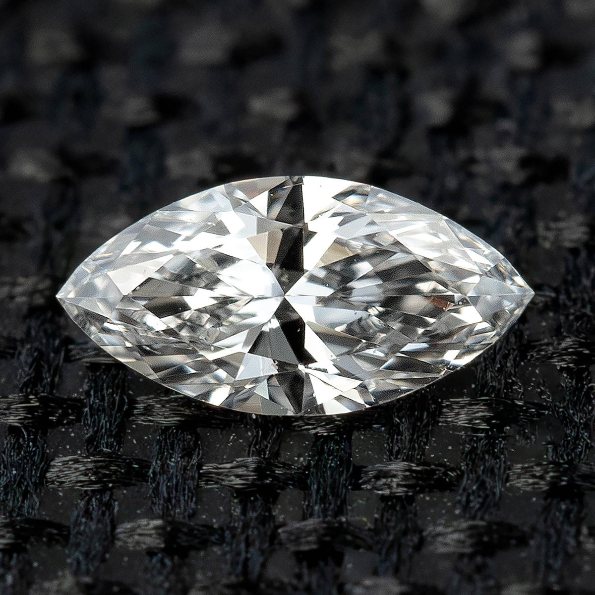 One 4 x 2 mm full brilliant marquise natural diamond shown face up.