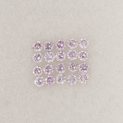 Representative 1mm purple-pink round diamonds arranged in a grid to show color and matching.