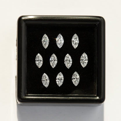 Straight-on black display box with ten white marquise diamonds on a pale background; quantity is chosen separately.