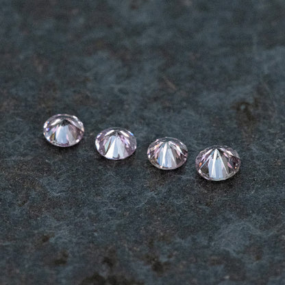 2.2 - 2.0 mm Fancy Vivid Purplish Pink Natural Pink Diamonds Round Brilliant SI1 0.15ct. Untreated 100% Natural