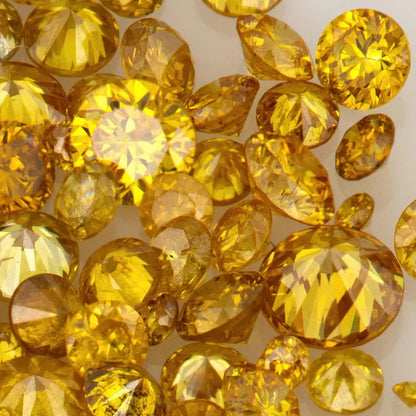 Fancy Vivid Yellowish Orange | Natural Untreated Diamonds | Round | Melee | Accents | Fancy Diamonds