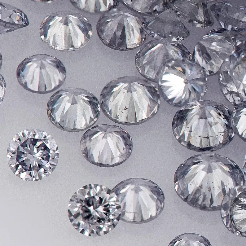 Fancy Vivid Blue Violet BL2/3 | Argyle Blue Diamonds | Select | Deluxe Australian | Untreated Natural | Round Melee Accents