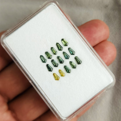 White sapphire display tray held in a hand to show the scale of the selection.