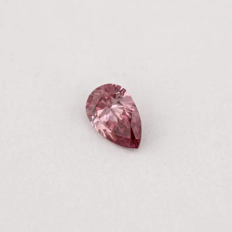 Argyle Certified 0.08ct 3P Fancy Vivid Pink Natural Argyle Pink Diamond Pear Brilliant