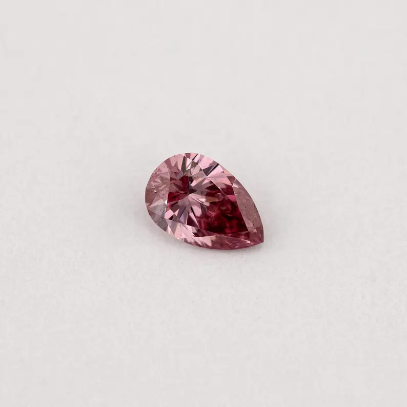 Argyle Certified 0.08ct 3P Fancy Vivid Pink Natural Argyle Pink Diamond Pear Brilliant