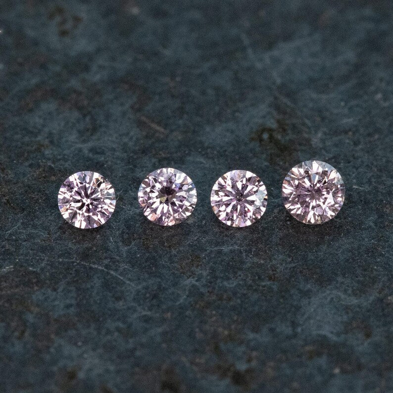 2.2 - 2.0 mm Fancy Vivid Purplish Pink Natural Pink Diamonds Round Brilliant SI1 0.15ct. Untreated 100% Natural