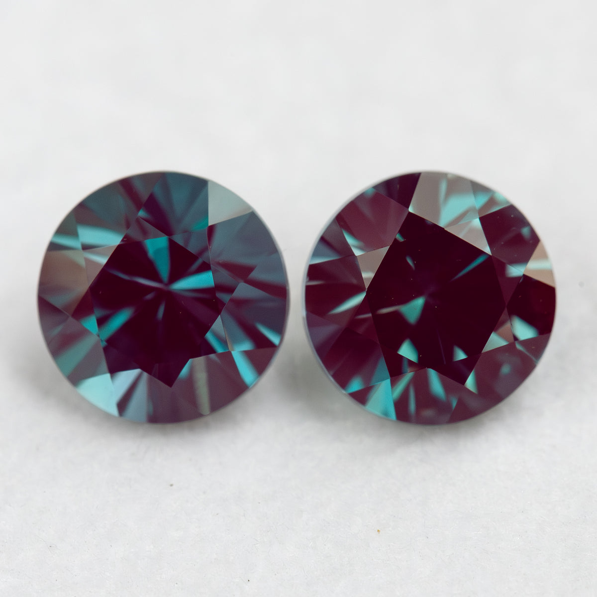 Two different-diameter round samples shown together for size comparison, not a same-size pair option.