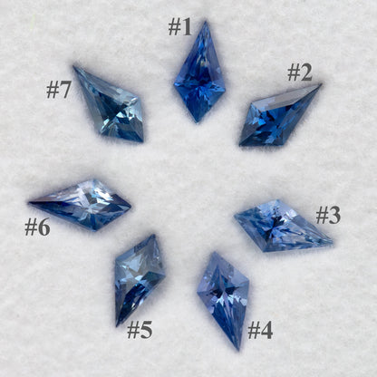 Seven blue kite-shaped sapphires labeled 1 through 7, identifying the original parcel stones.