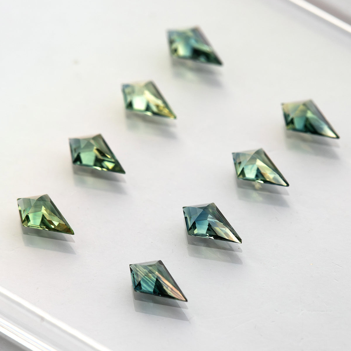 Oblique view of the original sapphire group, showing raised crown facets.