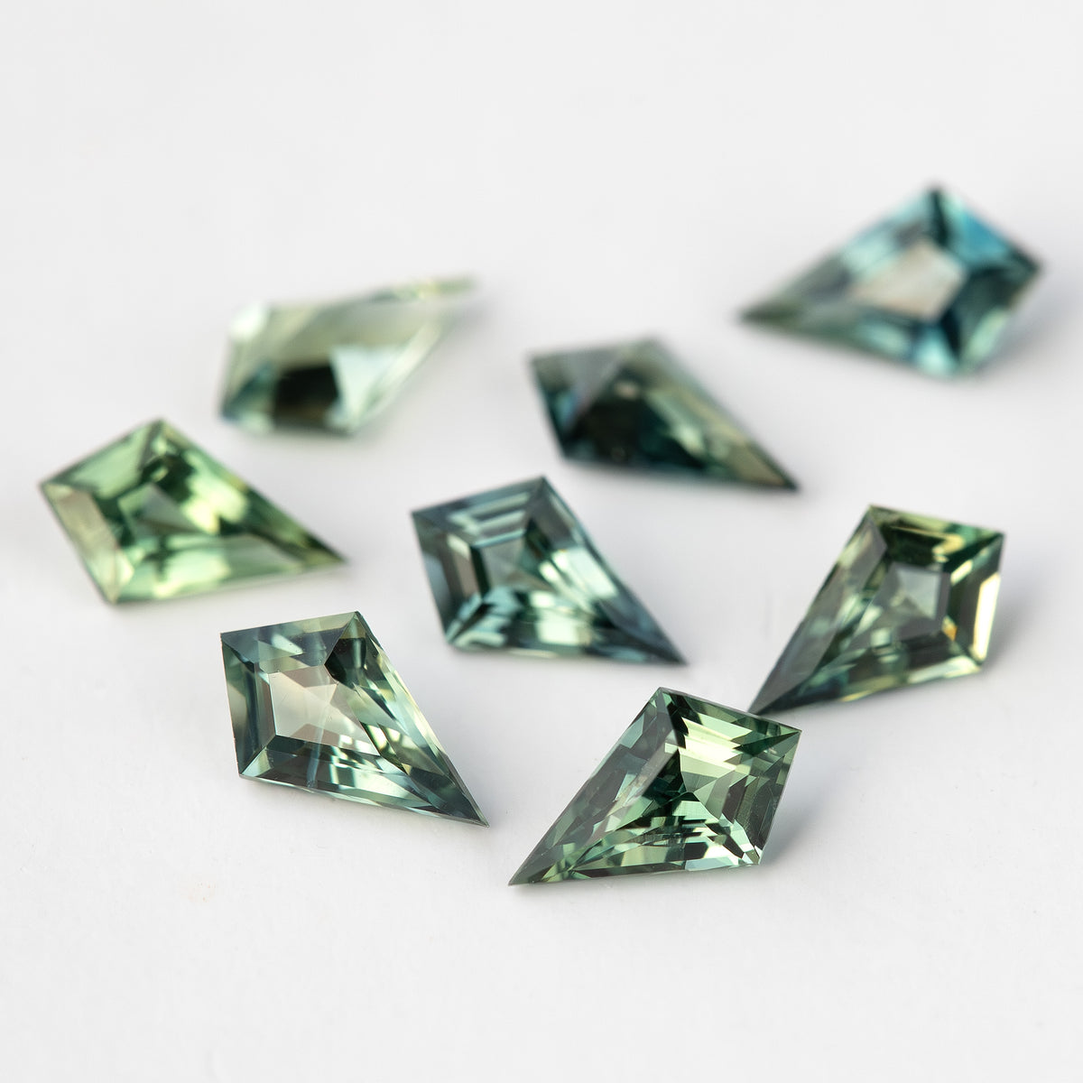 Close low-angle view of the original sapphire group, with foreground facets in focus.