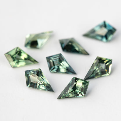 Close low-angle view of the original sapphire group, with foreground facets in focus.