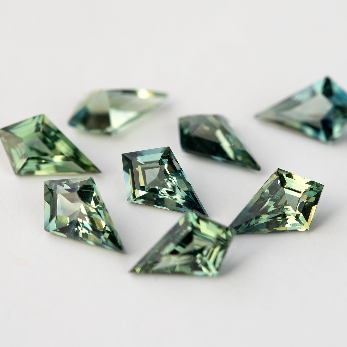 Close group view showing the kite outlines and varying green-blue tones.