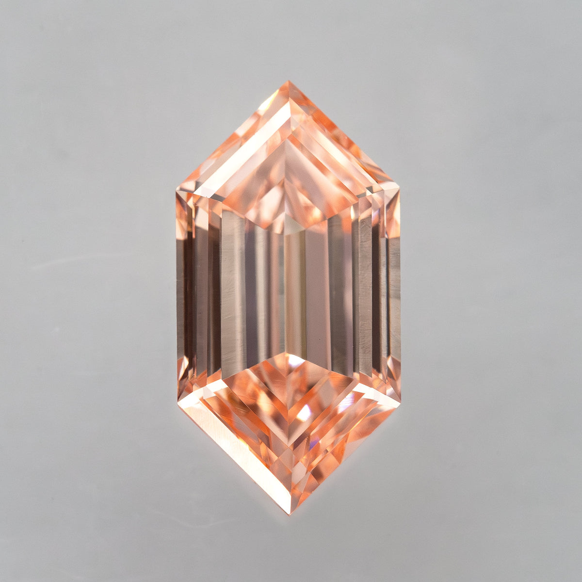 Vertical face-up view emphasizing the pointed elongated hexagon outline and central step facets.