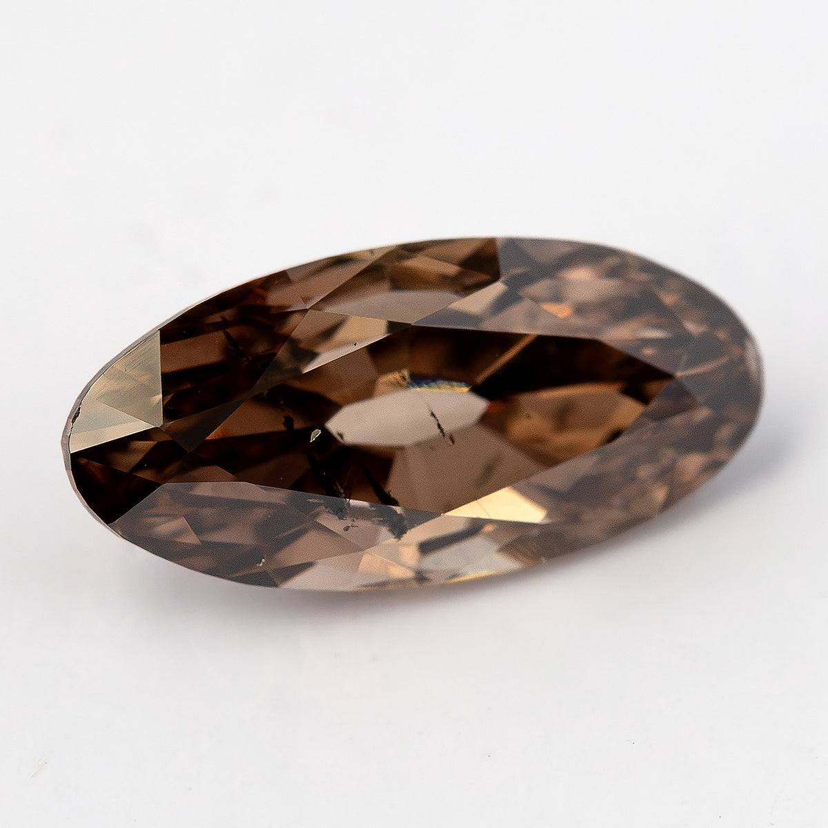 1.43 ct pinkish-brown lab-grown elongated oval diamond, oblique-angle view, SKU BLD154