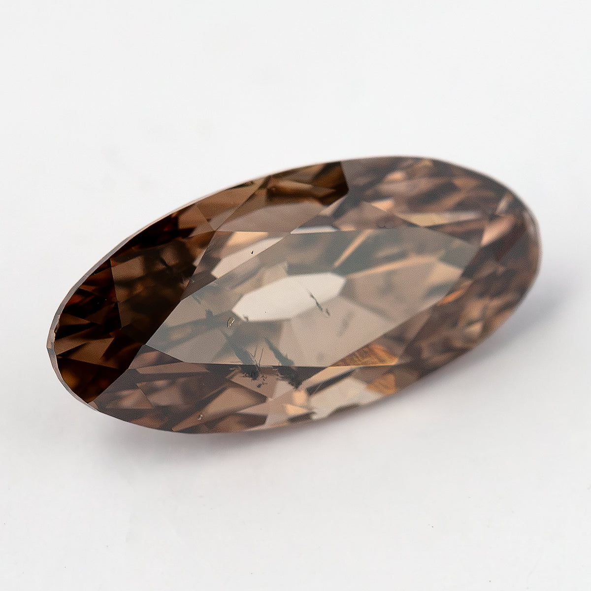 1.43 ct pinkish-brown lab-grown elongated oval diamond, light-angle view, SKU BLD154