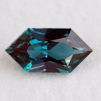 Face-up BLS113 lab-grown alexandrite on a white background, showing the Dutch Marquise Hexagon facet pattern.