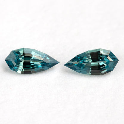 Alternate view of the two elongated pear BLS114 sapphires as a matched pair.