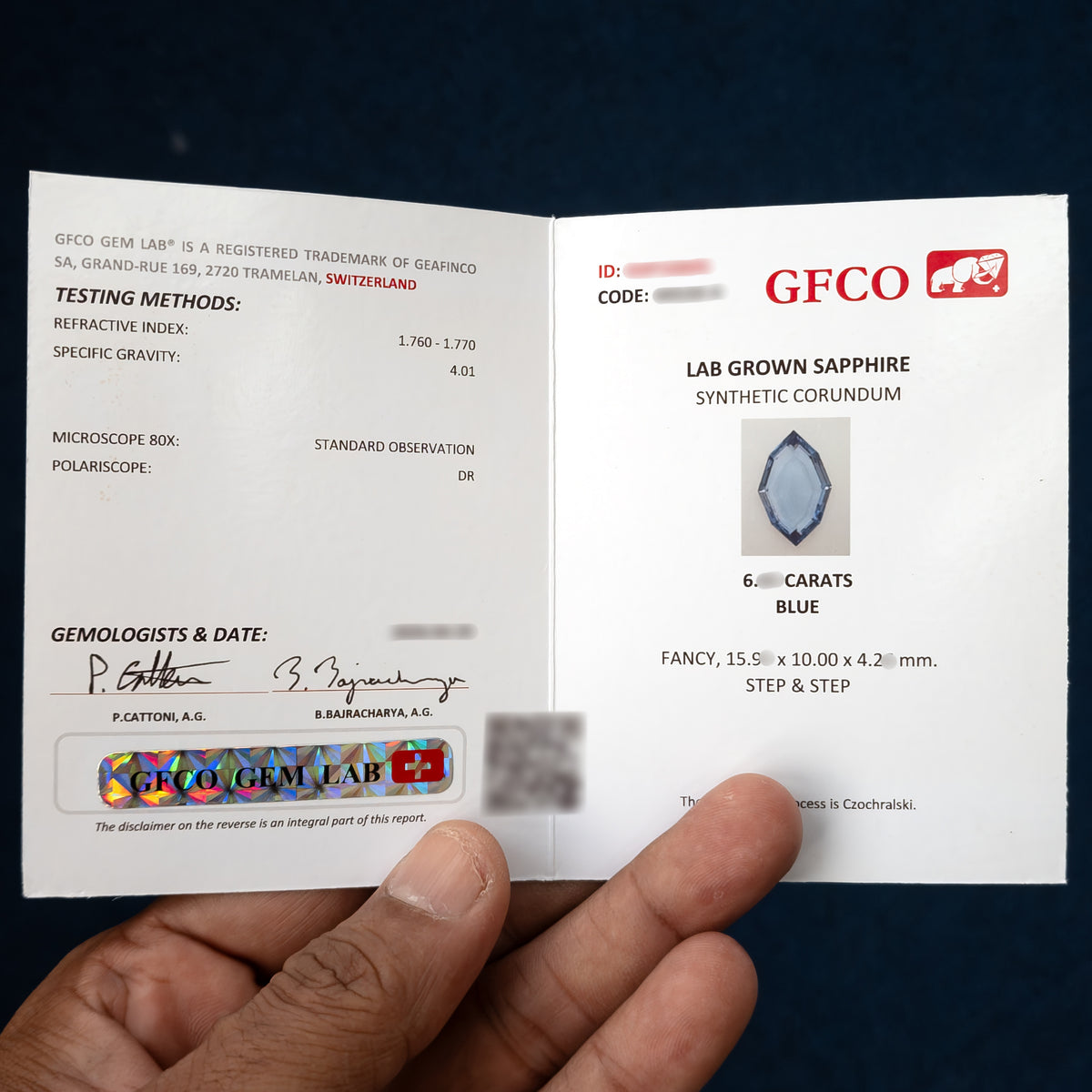 Representative sample GFCO report for lab-grown blue sapphire, with identifying numbers and some measurements masked. Each supplied piece has its own local laboratory report.