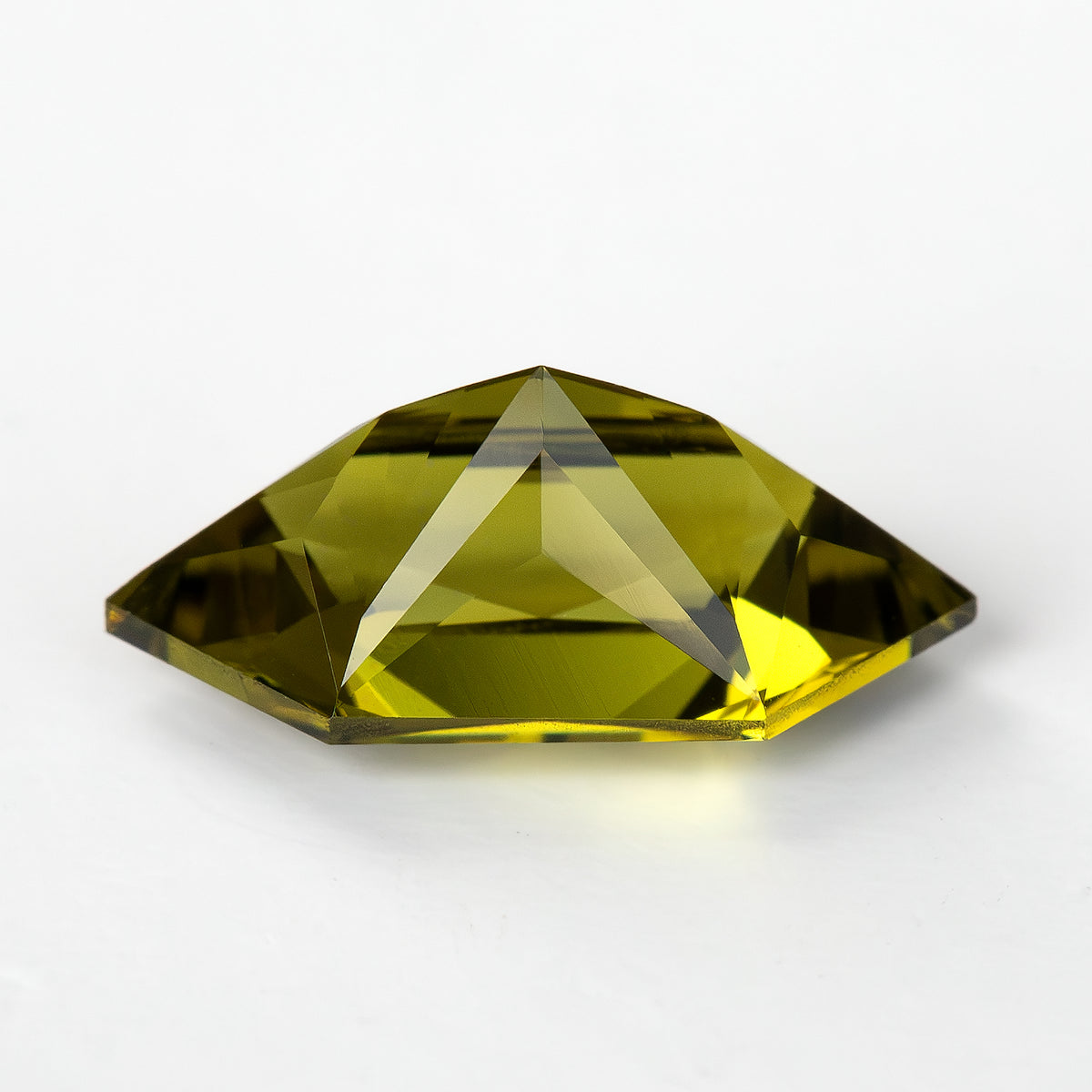 Pavilion view of the hexagonal lab-grown sapphire showing the pointed underside.