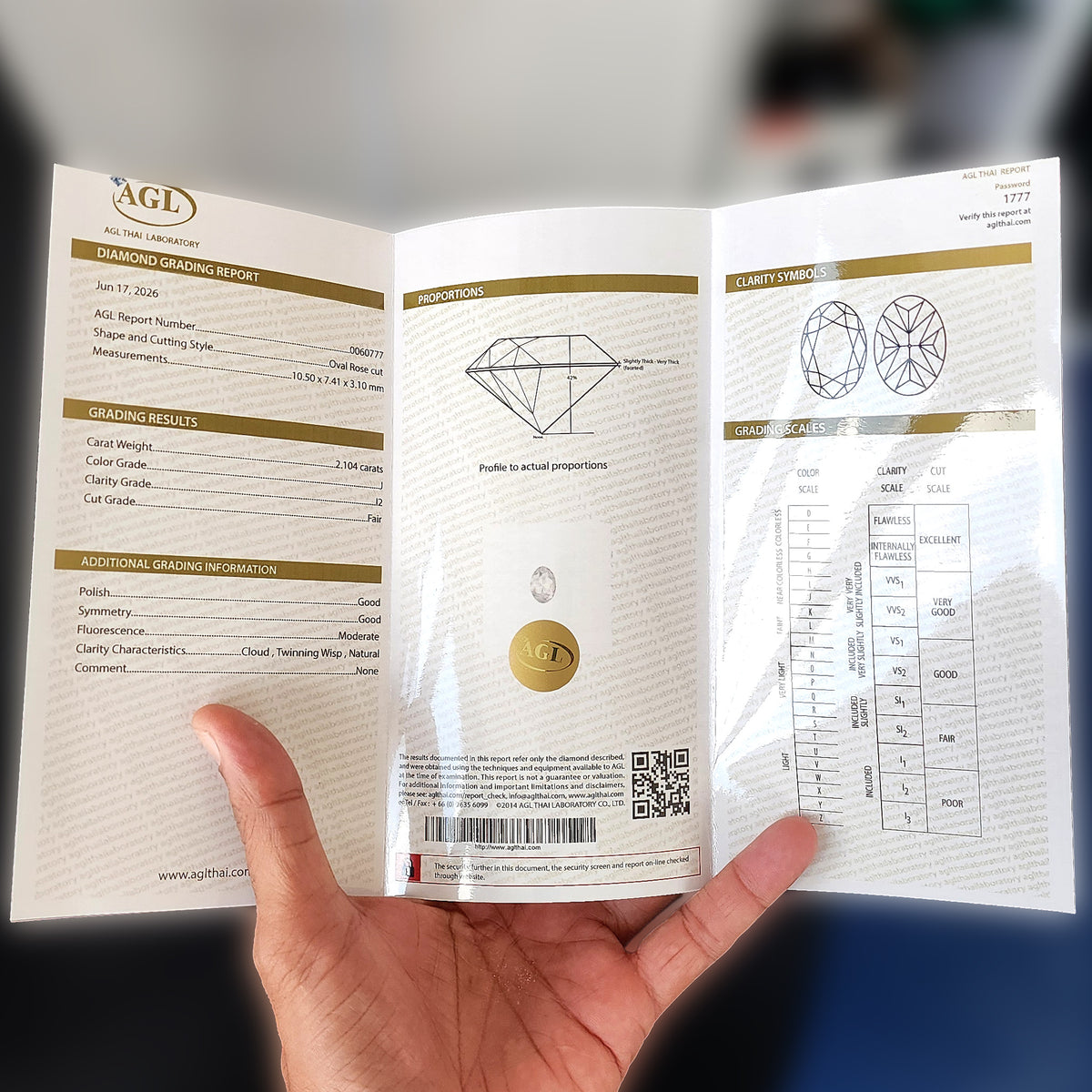 Open AGL Thai Laboratory grading report 0060777 for the pictured oval diamond.