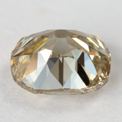 Side profile of the diamond resting on its crown, showing the girdle, pavilion depth and large culet facet.