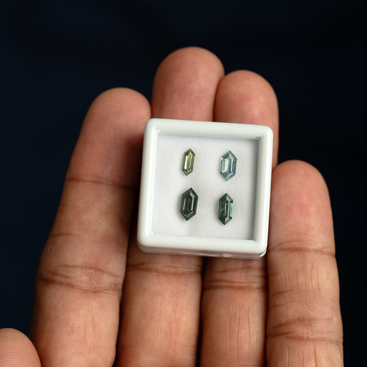 Hand-held daylight scale view of the sapphire selection.