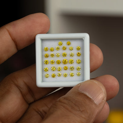 Wider hand-held tray view with the yellow diamonds and fingers visible.