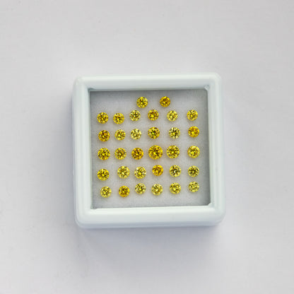 Wider view of the white tray resting on a pale surface with yellow diamonds in rows.