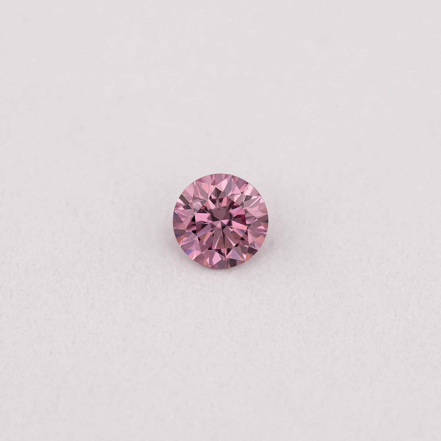 GIA Certified 0.06ct Fancy Intense Purplish Pink Natural Argyle Pink Diamond Round Brilliant VS1