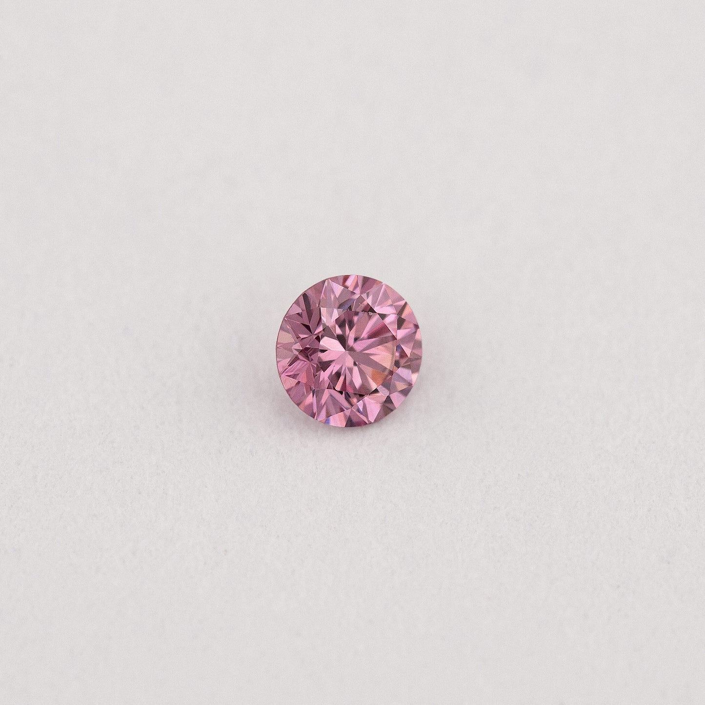 GIA Certified 0.06ct Fancy Intense Purplish Pink Natural Argyle Pink Diamond Round Brilliant VS1
