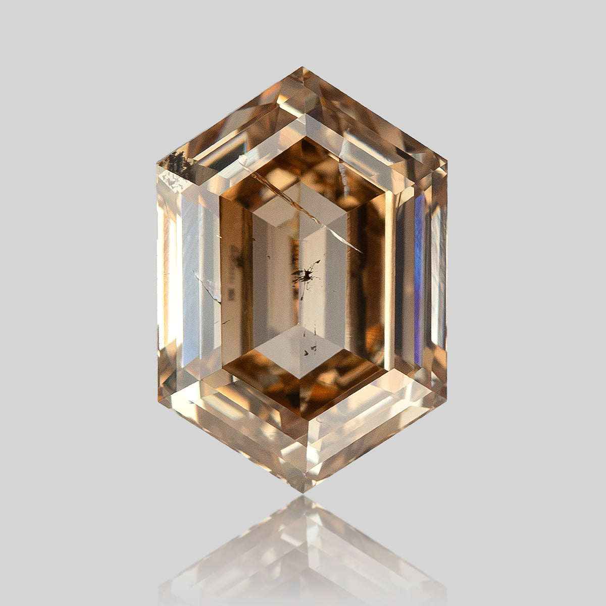 Upright face-up view showing the elongated hexagonal outline. IGI-HEXA-5925-0110CT.