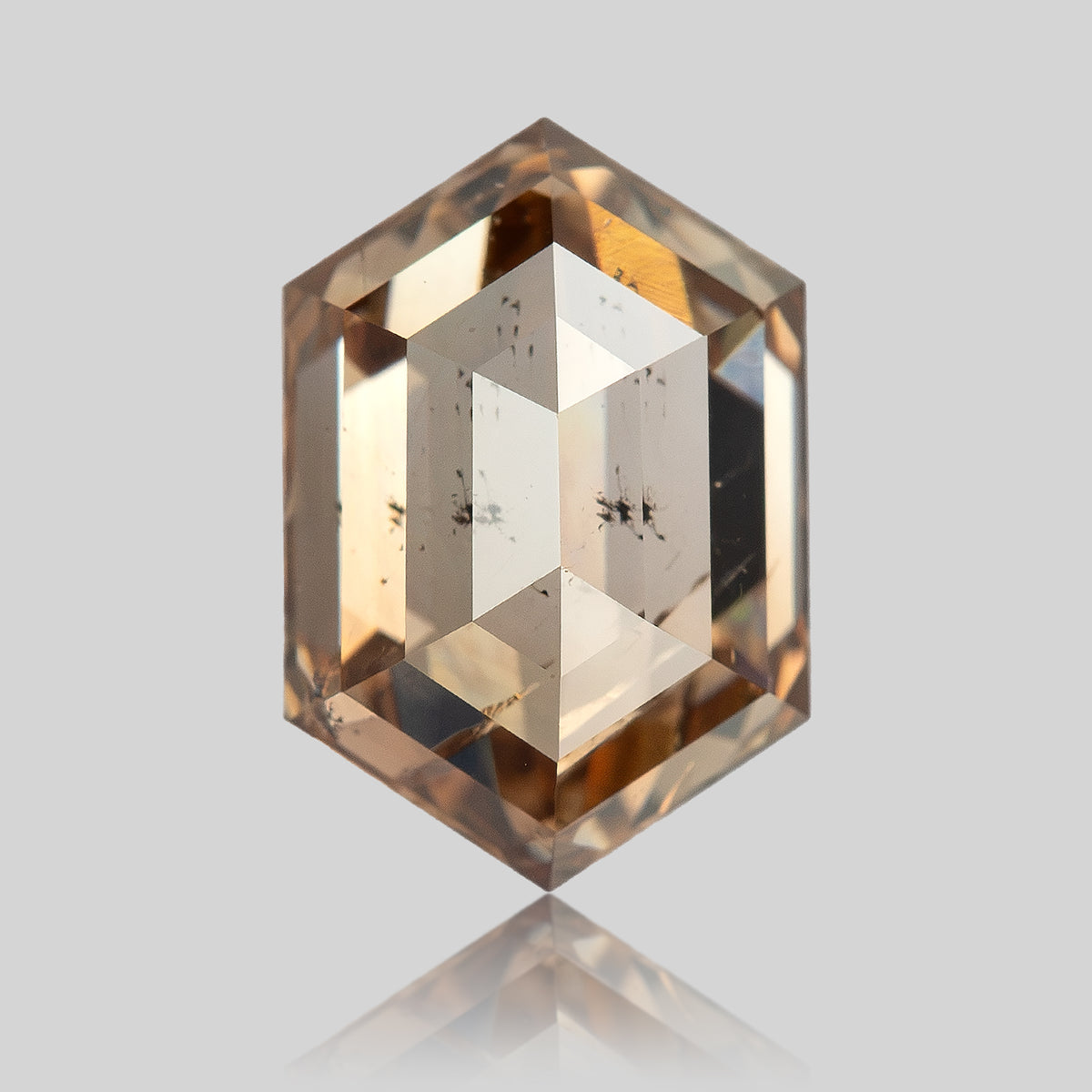 Upright face-up close-up showing dark internal characteristics. IGI-HEXA-5925-0110CT.