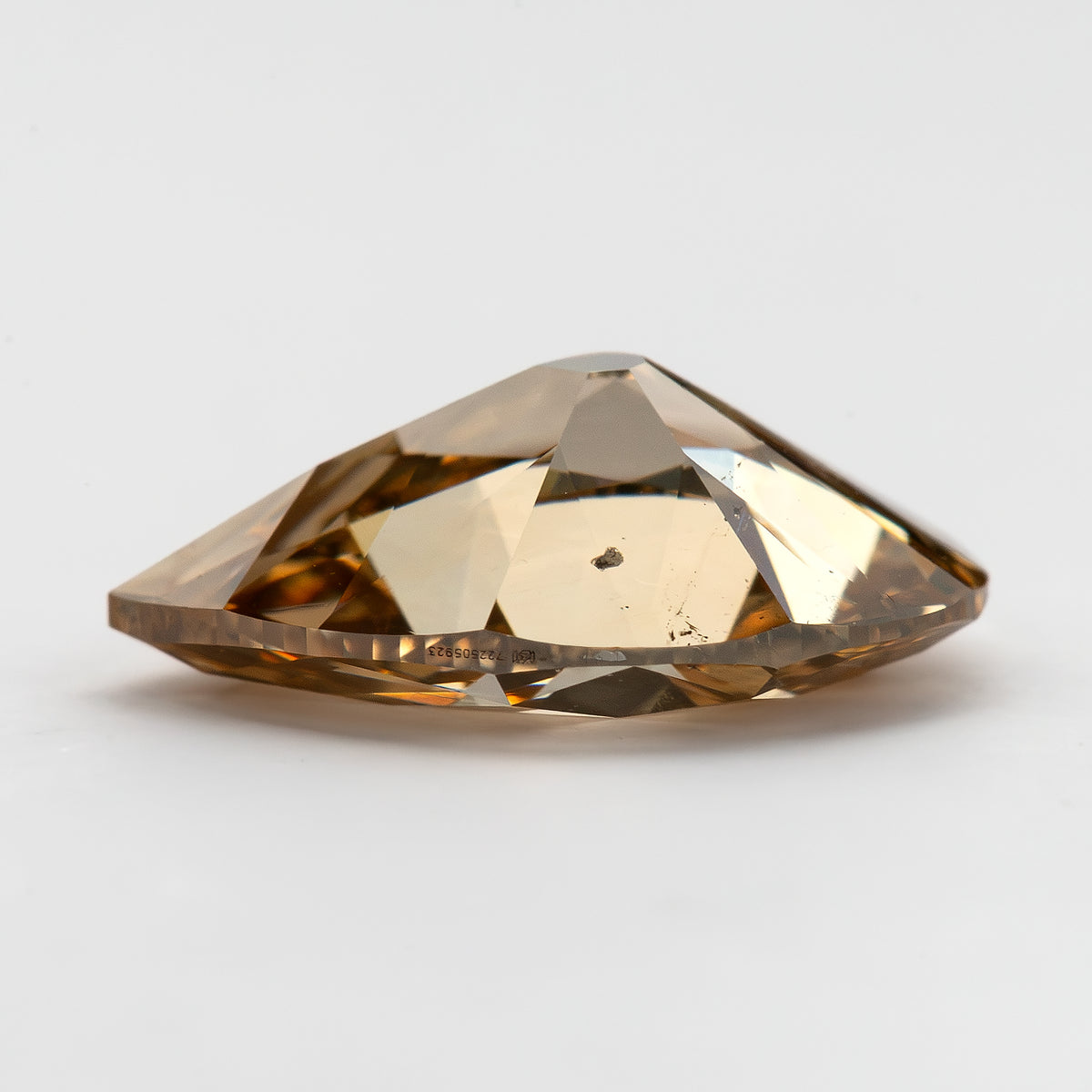 Low side profile showing crown, pavilion and girdle inscription. IGI-PS-5923-0103CT.