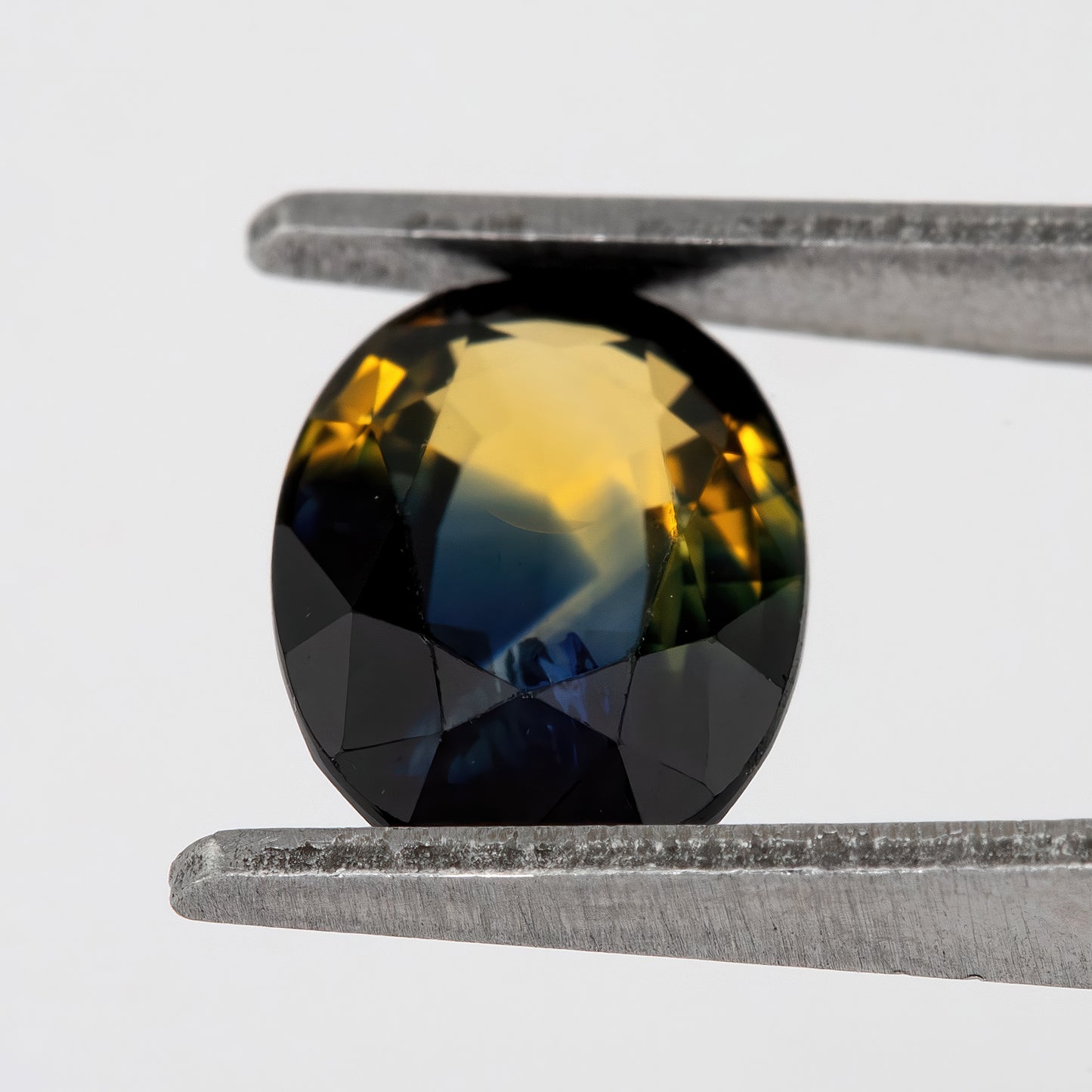 Deep Blue Champagne Sapphire | 1.99 Ct Oval Cut Bicolor Gemstone | Unheated Eye Clean Stone for Rings and Jewelry