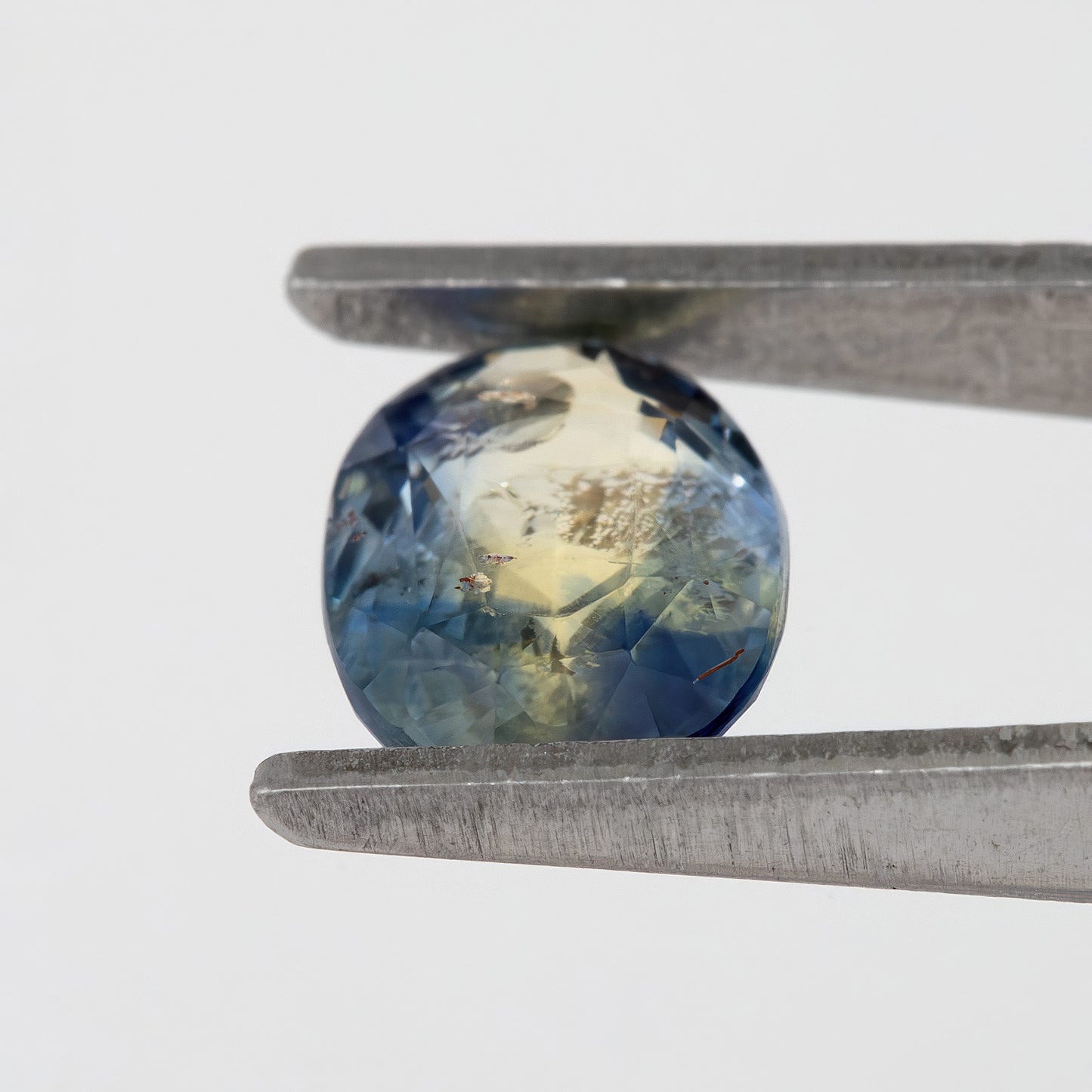 Soft Blue Champagne Bicolor Sapphire | 1.34 Ct Oval Cut Untreated Gemstone | Eye Clean Unique Zoning for Rings & Fine Jewelry
