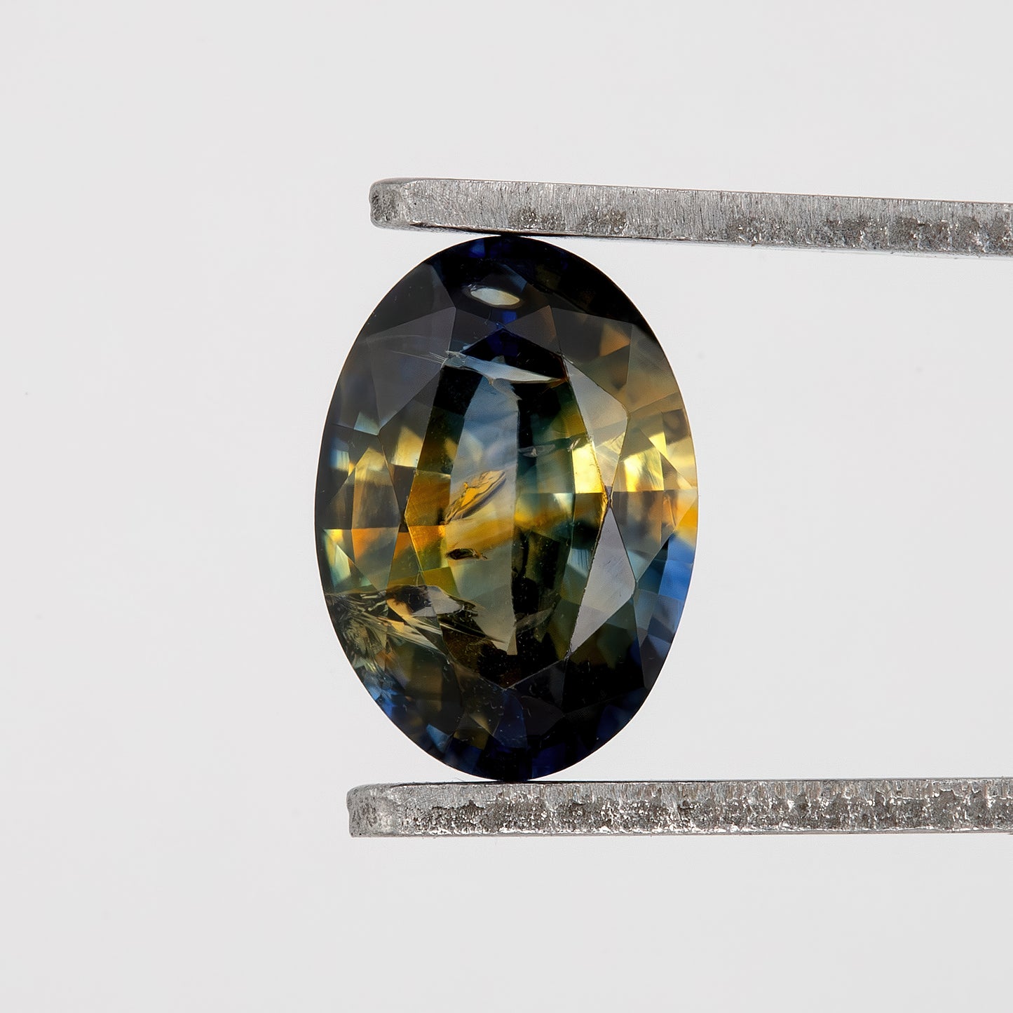 Golden Midnight Bicolor Sapphire | 0.96 Ct Natural Unheated Oval Cut | Eye Clean Loose Gemstone for Fine Custom Jewelry