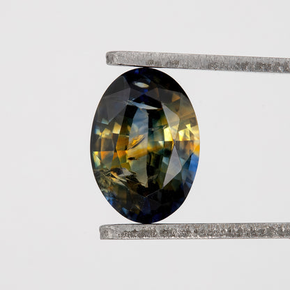 Golden Midnight Bicolor Sapphire | 0.96 Ct Natural Unheated Oval Cut | Eye Clean Loose Gemstone for Fine Custom Jewelry