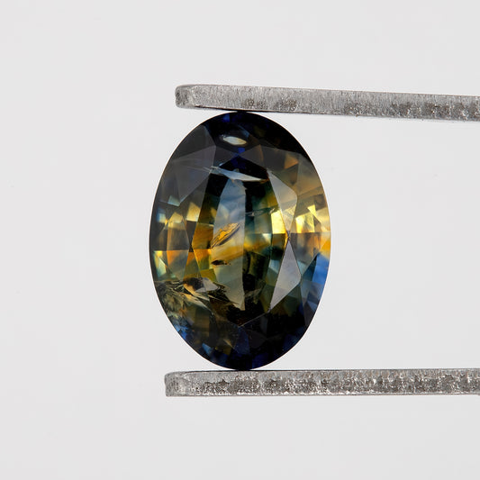 Golden Midnight Bicolor Sapphire | 0.96 Ct Natural Unheated Oval Cut | Eye Clean Loose Gemstone for Fine Custom Jewelry