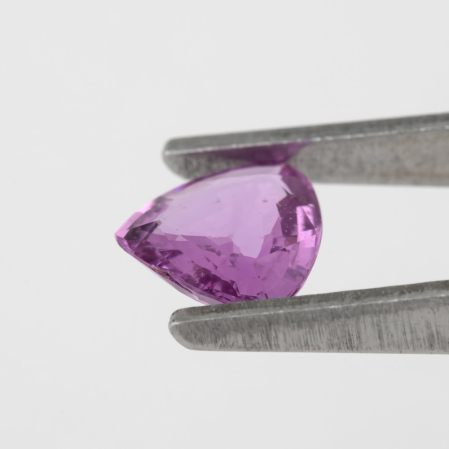 Bright Pinkish Purple Sapphire | 0.66ct Trillion Cut Heated Natural Gemstone | For Unique Engagement Rings & Fine Jewelry