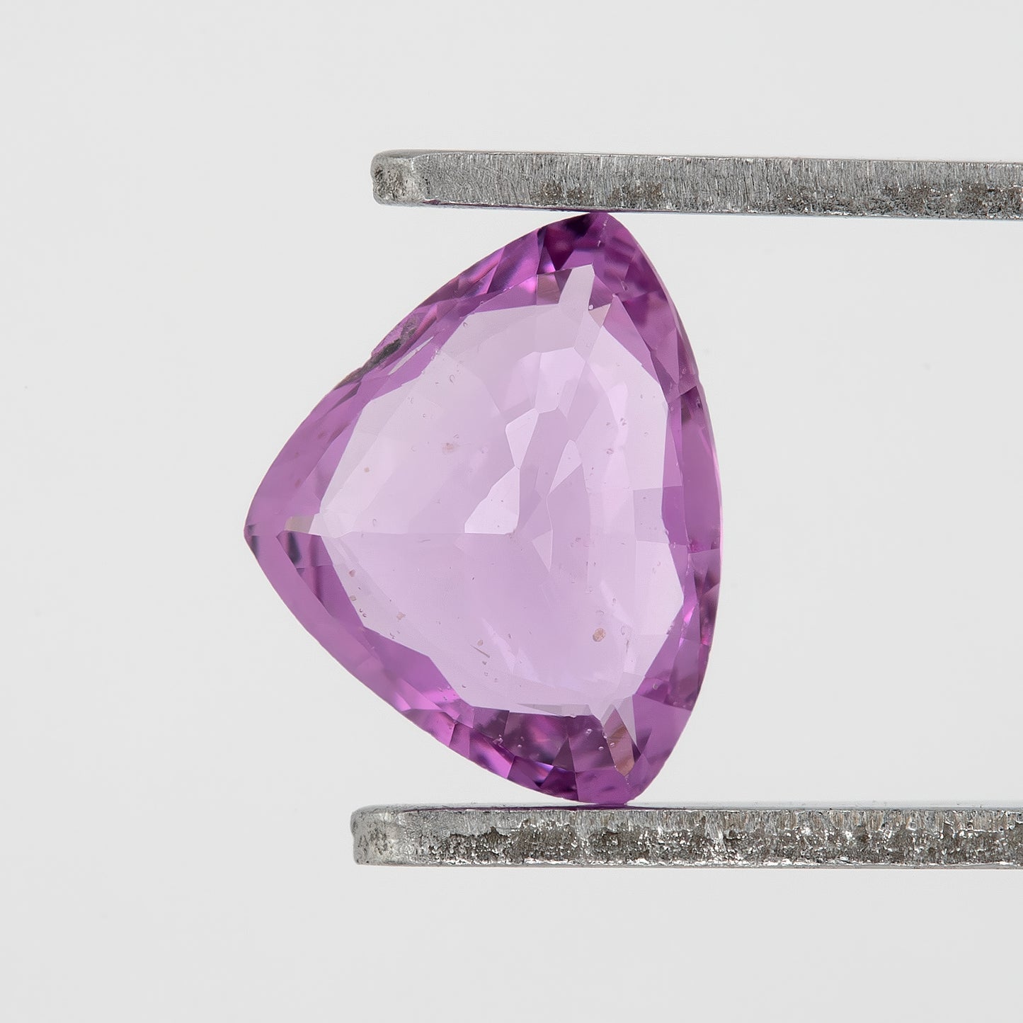Bright Pinkish Purple Sapphire | 0.66ct Trillion Cut Heated Natural Gemstone | For Unique Engagement Rings & Fine Jewelry