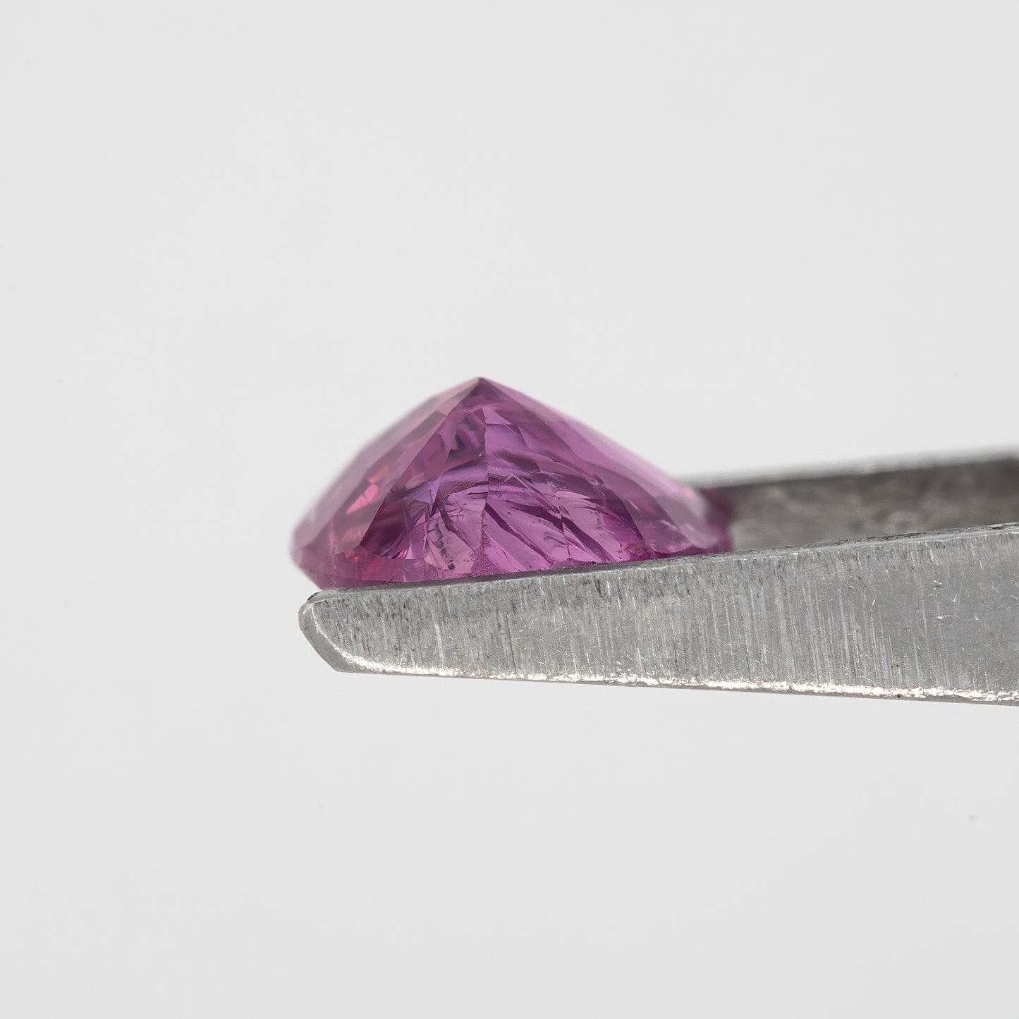 Pinkish Purple | 1.05 Carat Trillion Cut Heated Natural Sapphire for Unique Fine Jewelry and Artisan Designs
