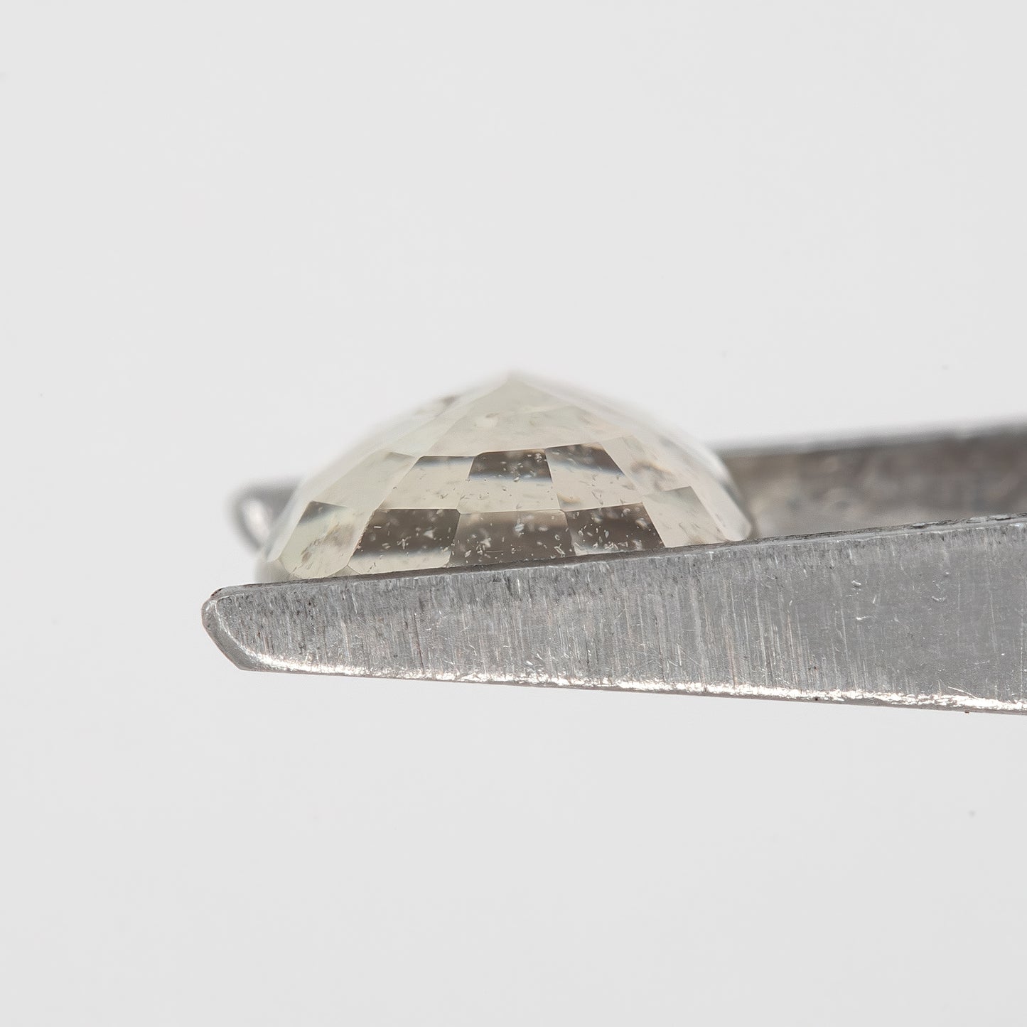 Champagne White | 1.75 Carat Oval Cut Heated Natural Sapphire with Rustic Inclusions for Artisan Jewelry Designs