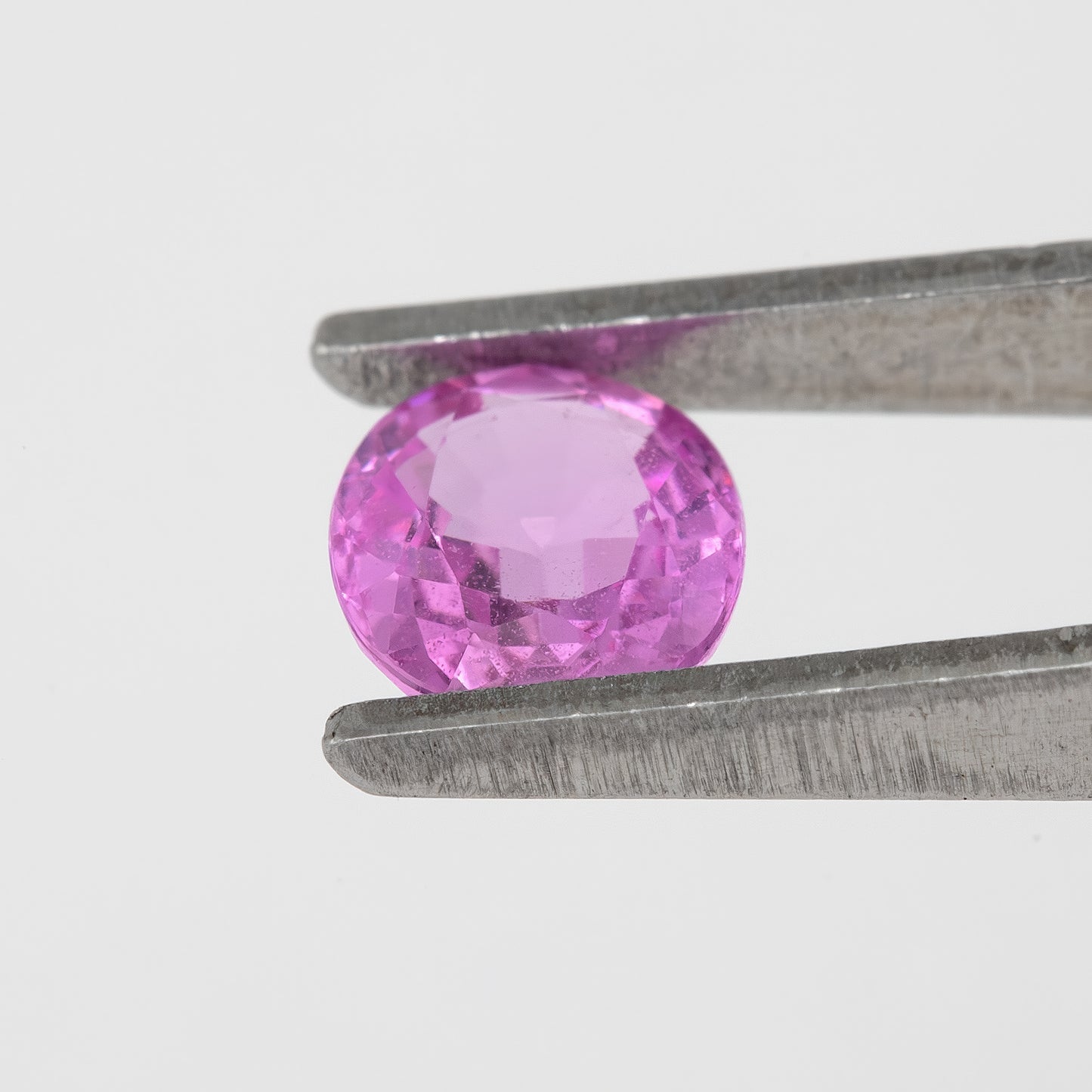 Vivid Pink Sapphire | 0.74 Carat Oval Cut Heated Sapphire | Bright Natural Gemstone for Petite Rings, Pendants & Artisan Jewelry Designs